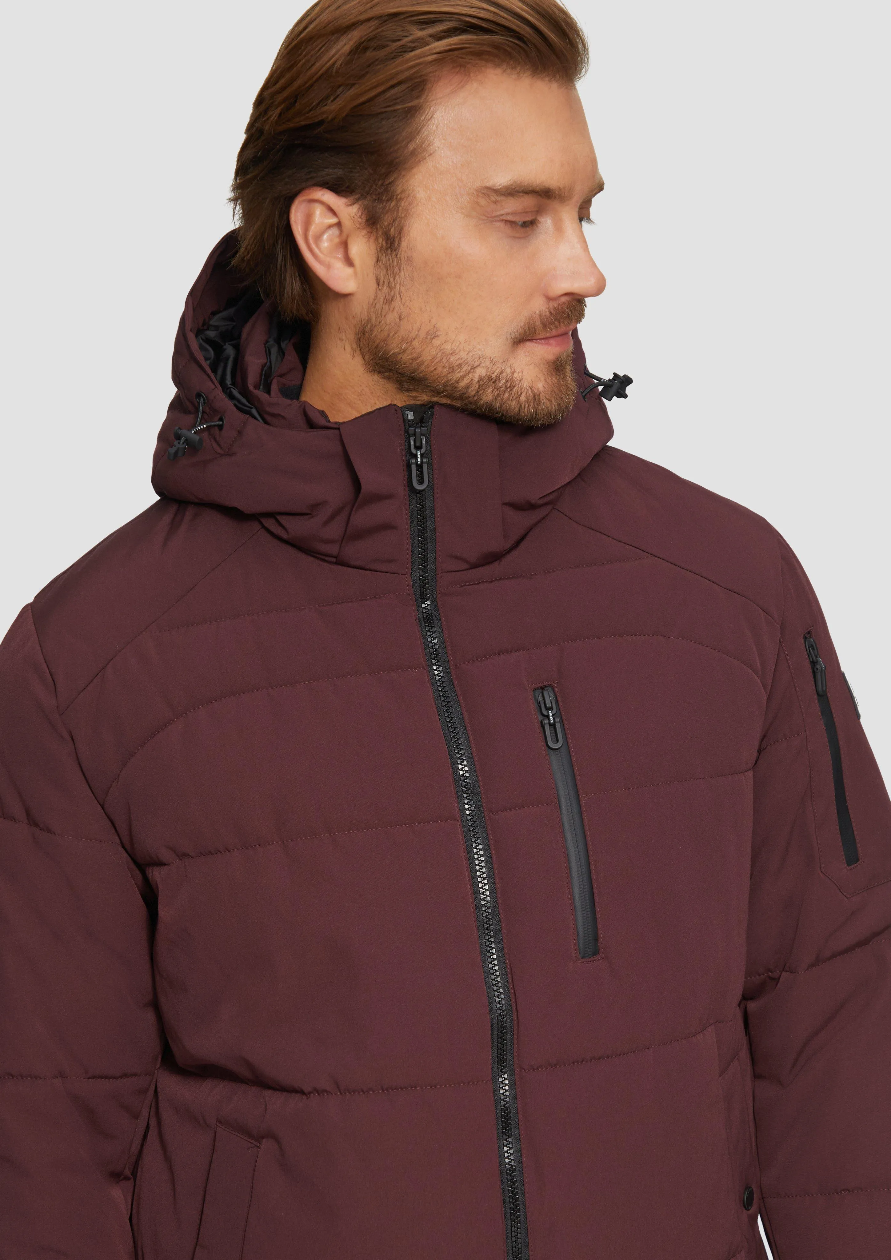 Veste hydrofuge à capuche amovible